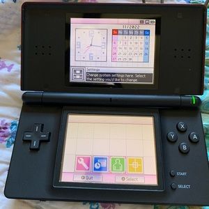 Nintendo DS Lite with games harvest moon Pokémon super Mario world